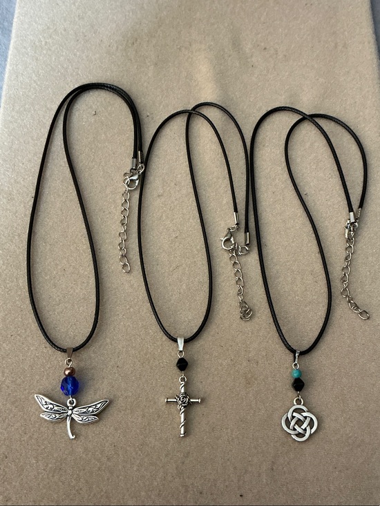 Jewelry - Black Cord Pendant Necklace Trio with Silver Dragonfly, Cross & Celtic Knot